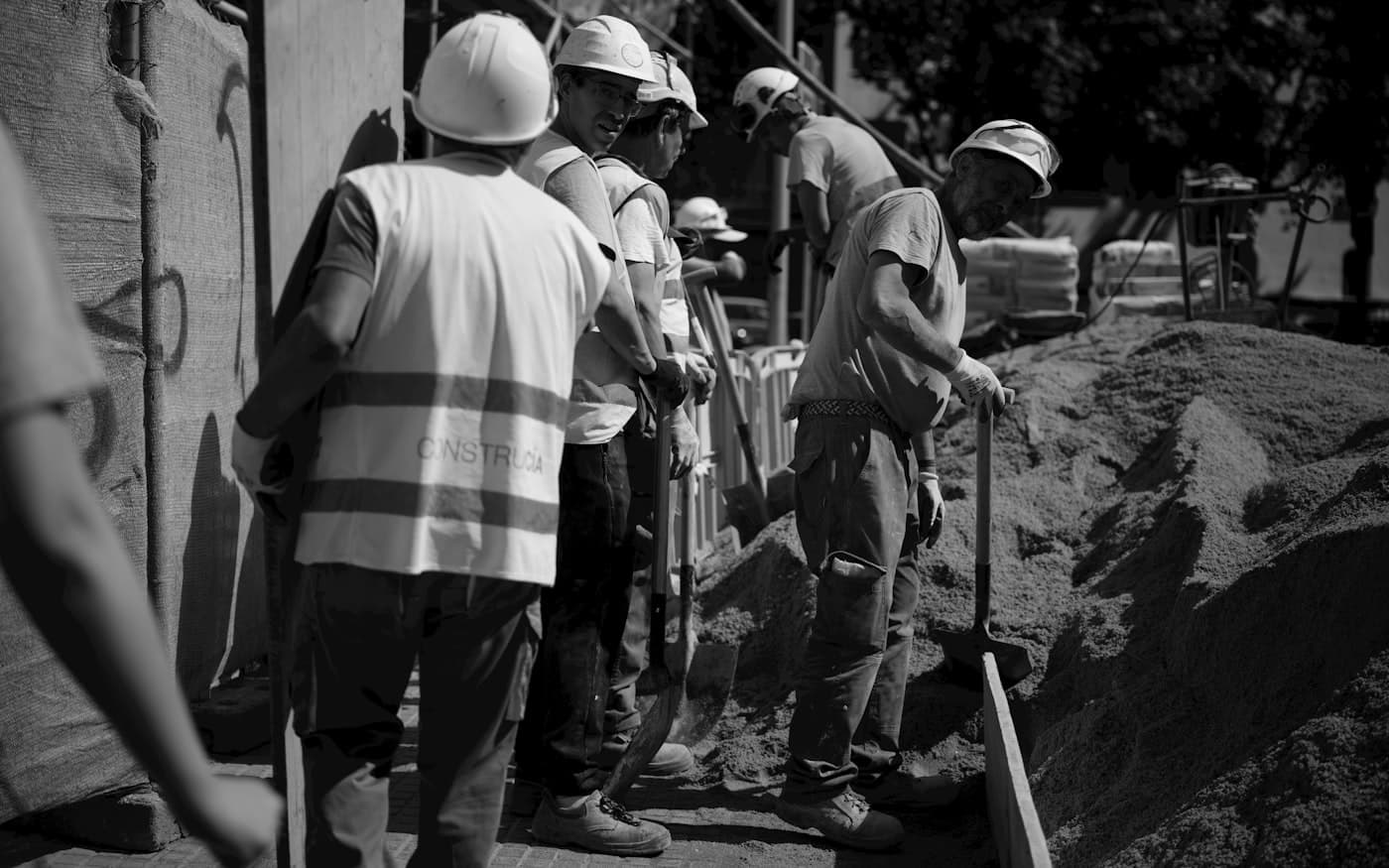 Construction workers on an active demolition site